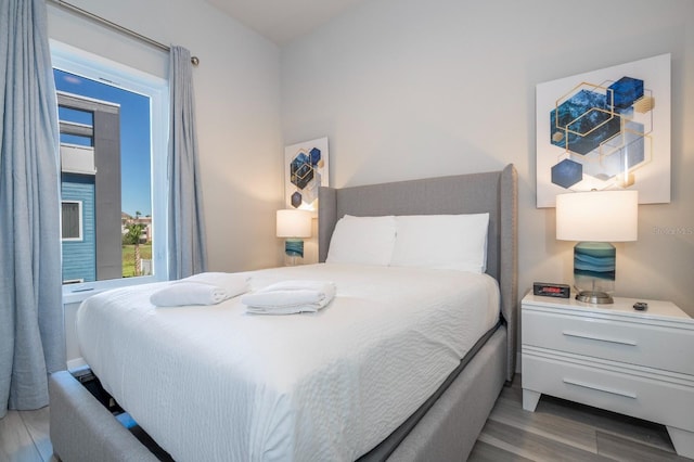 bedroom featuring hardwood / wood-style flooring