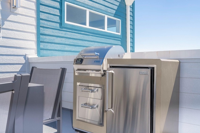 exterior details featuring stainless steel refrigerator