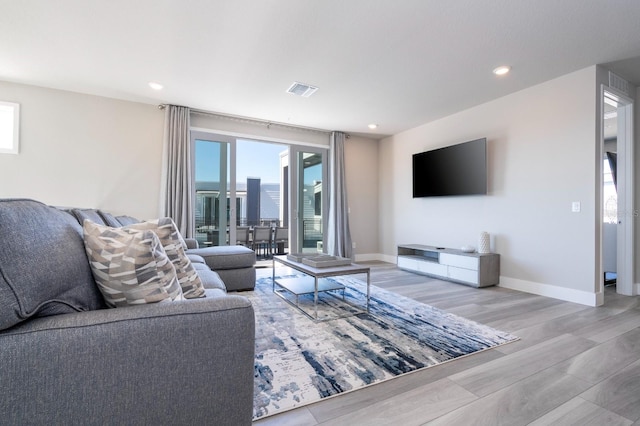 living room featuring light hardwood / wood-style floors