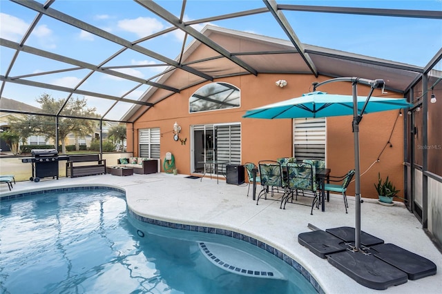 view of pool with glass enclosure, a patio area, an outdoor living space, and a grill