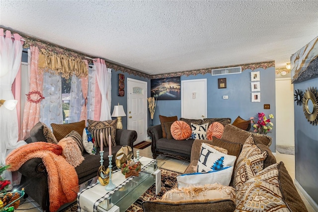 living room featuring a textured ceiling