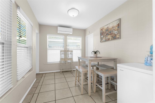 tiled dining space featuring an AC wall unit