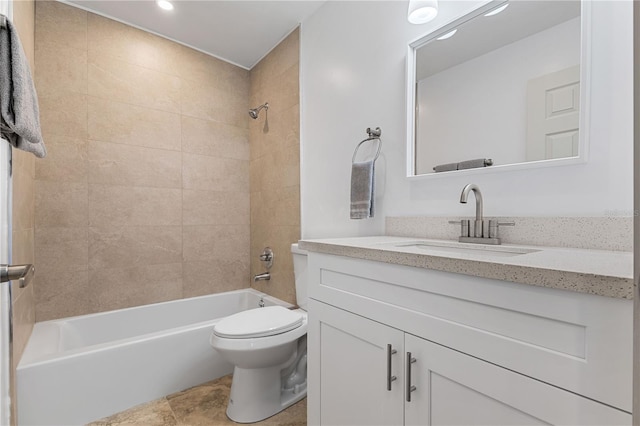 full bathroom with tile patterned floors, vanity, toilet, and tiled shower / bath