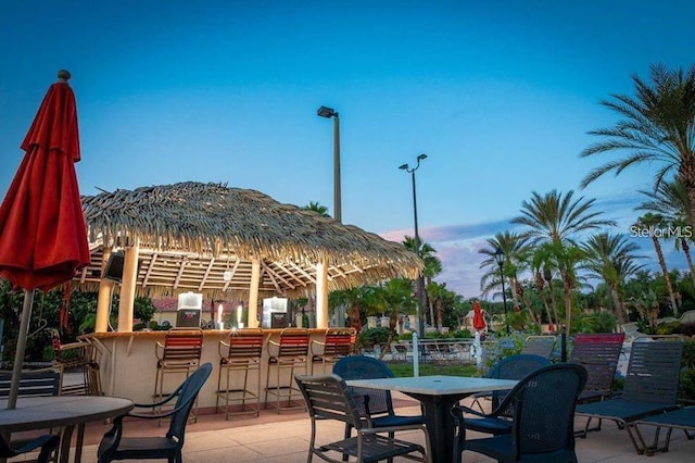 view of patio with a bar