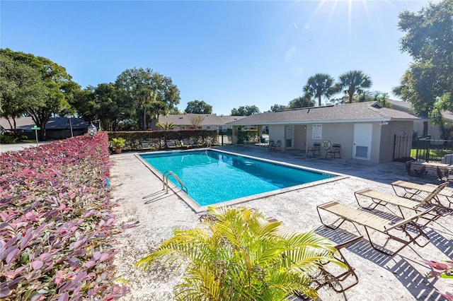 view of pool featuring a patio area