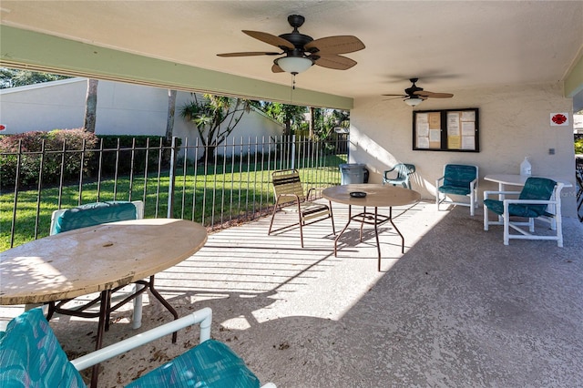 view of patio featuring ceiling fan