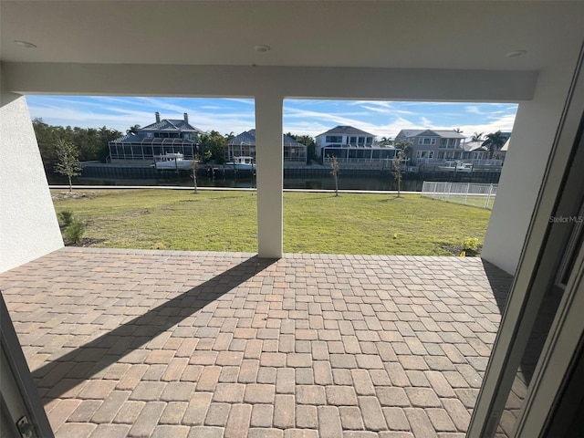 view of patio / terrace featuring a water view