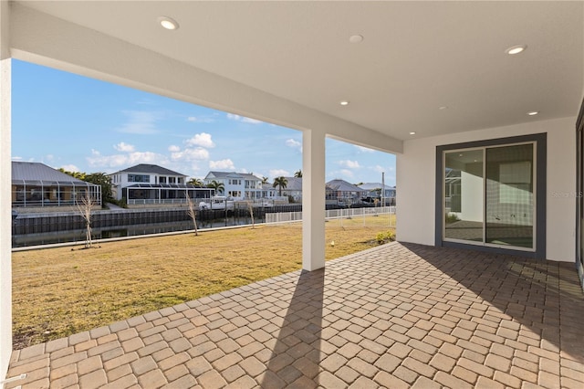 view of patio / terrace with a water view