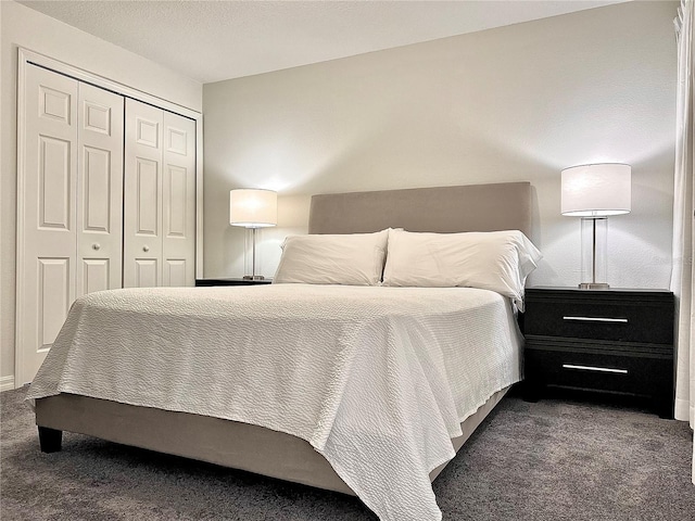 carpeted bedroom with a closet