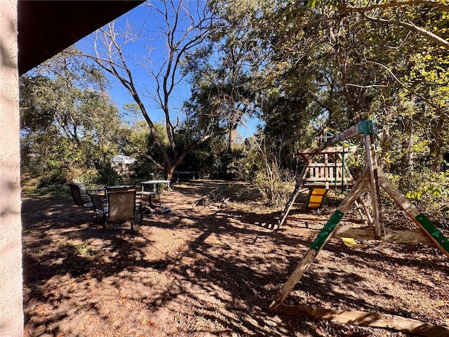 view of yard featuring a playground