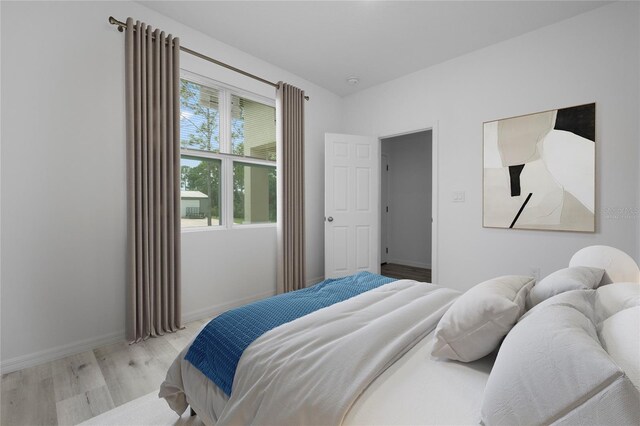 bedroom featuring light wood-type flooring