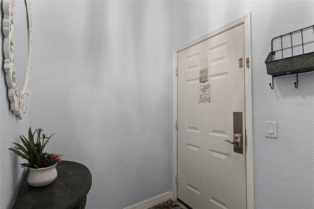 608 Gran Bahama Blvd Unit 608, Davenport, FL 33897 - doorway to outside with baseboards