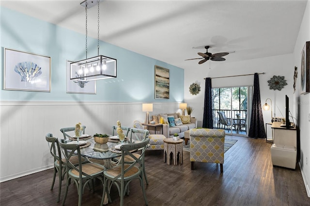 608 Gran Bahama Blvd Unit 608, Davenport, FL 33897 - dining room with dark wood-type flooring, wainscoting, and a ceiling fan