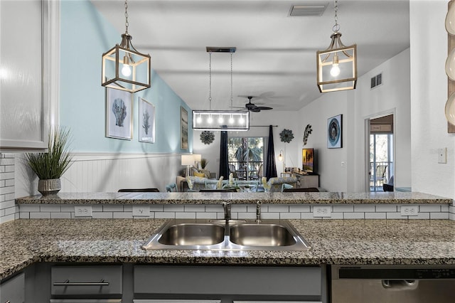 608 Gran Bahama Blvd Unit 608, Davenport, FL 33897 - kitchen featuring stainless steel dishwasher, a sink, ceiling fan, and hanging light fixtures