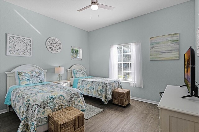 608 Gran Bahama Blvd Unit 608, Davenport, FL 33897 - bedroom featuring wood finished floors, baseboards, and ceiling fan