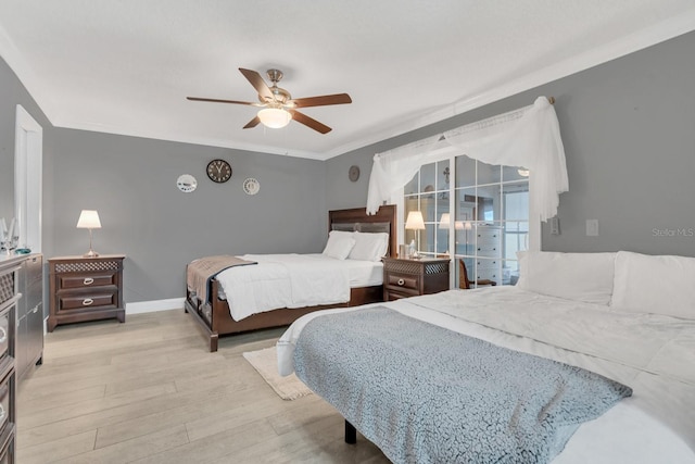 bedroom with ornamental molding, ceiling fan, and light wood-type flooring