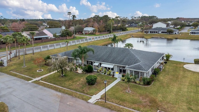 bird's eye view with a water view