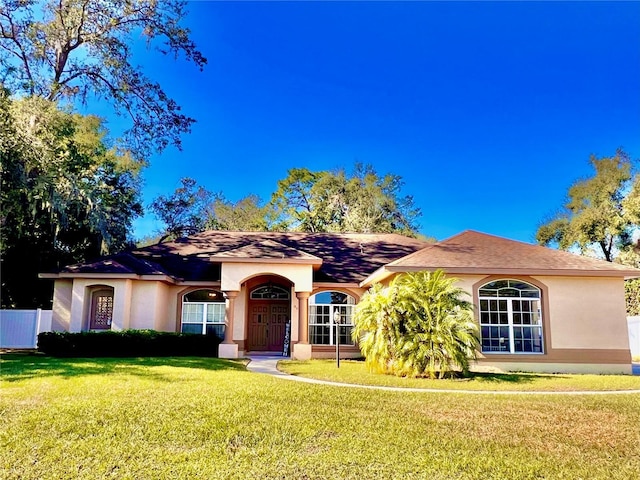 view of front of home with a front yard