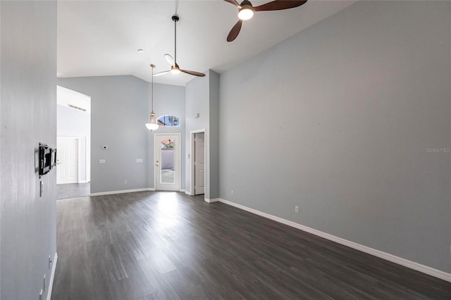 unfurnished room with dark hardwood / wood-style floors, ceiling fan, and high vaulted ceiling