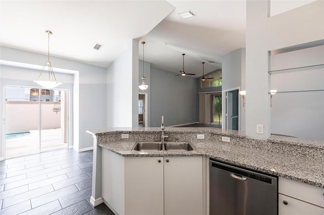 kitchen featuring white cabinets, ceiling fan, sink, dishwasher, and hanging light fixtures