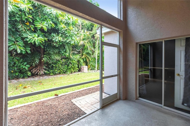 doorway featuring concrete flooring