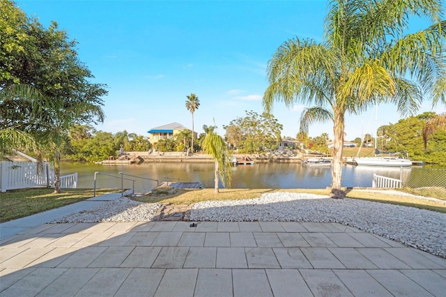 view of patio with a water view