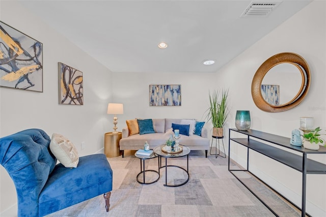 living room featuring light carpet