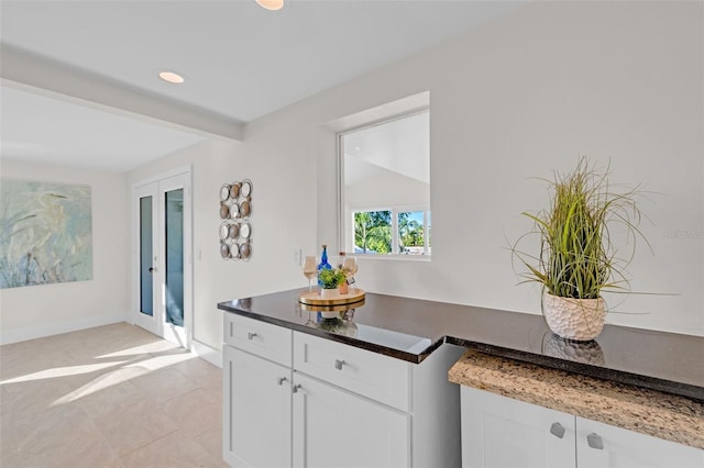 4059 Orient Dr, Hernando Beach, FL 34607 - kitchen with white cabinetry, recessed lighting, and a peninsula