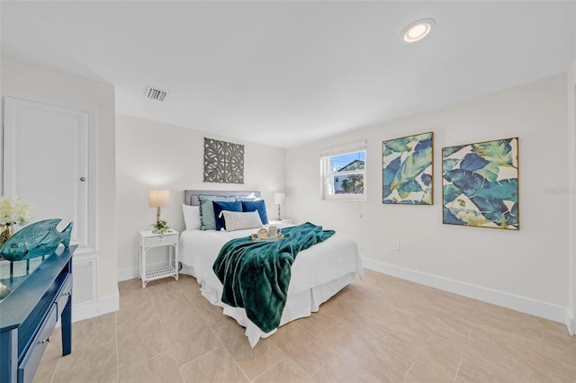 4059 Orient Dr, Hernando Beach, FL 34607 - bedroom featuring baseboards, light tile patterned floors, and recessed lighting