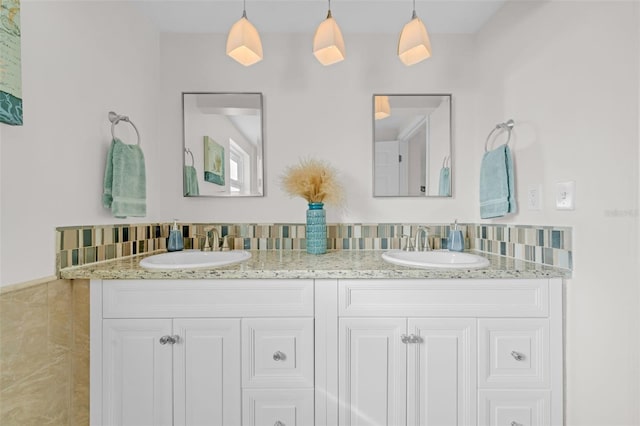 4059 Orient Dr, Hernando Beach, FL 34607 - full bathroom with double vanity and tasteful backsplash