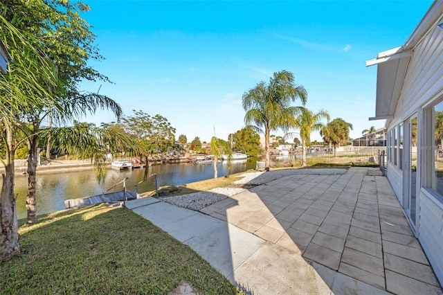 view of patio featuring a water view