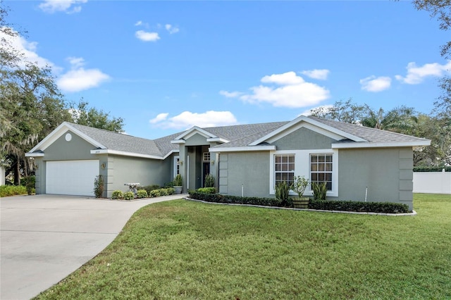 ranch-style house with a garage and a front lawn