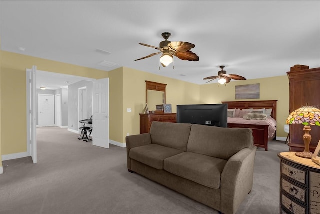 living room featuring ceiling fan and light colored carpet