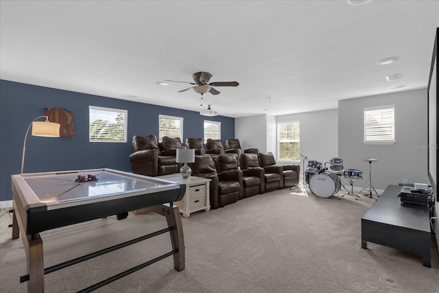 playroom featuring light colored carpet and ceiling fan