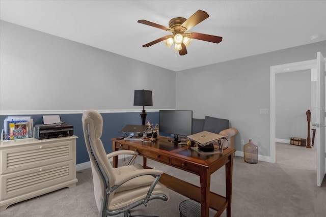 office area with ceiling fan and light colored carpet