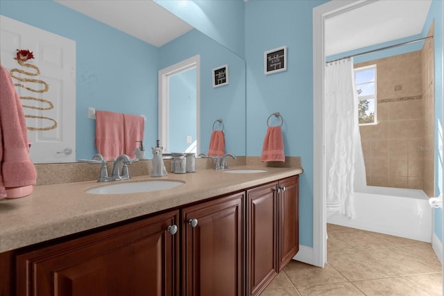 bathroom featuring tile patterned flooring, vanity, and shower / tub combo with curtain