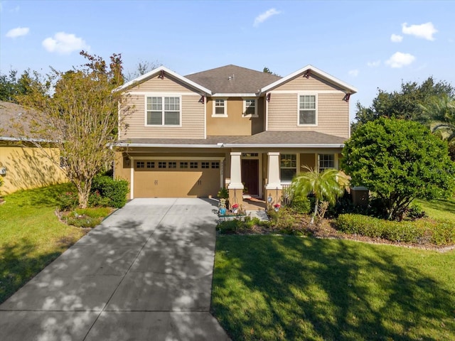 craftsman-style house with a front yard and a garage