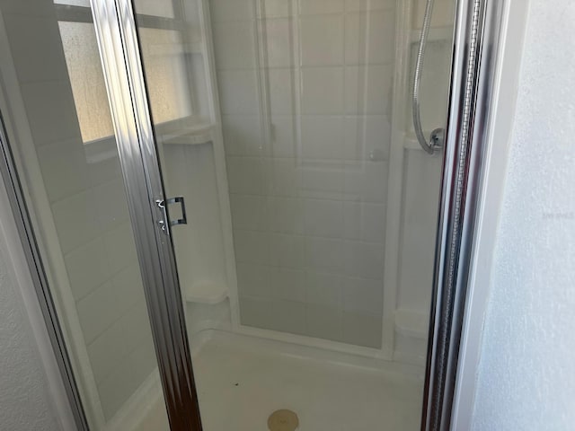 bathroom featuring walk in shower