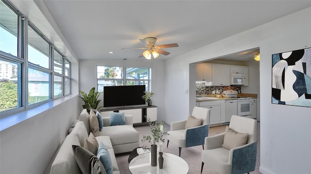 living room featuring ceiling fan