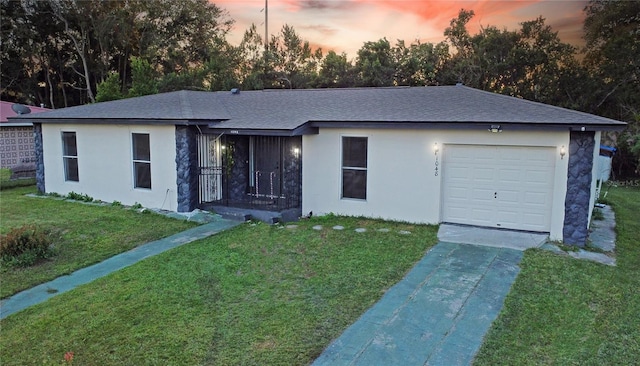1048 Wakefield Cir, Deltona, FL 32725 - ranch-style home featuring a front yard, driveway, a garage, and roof with shingles