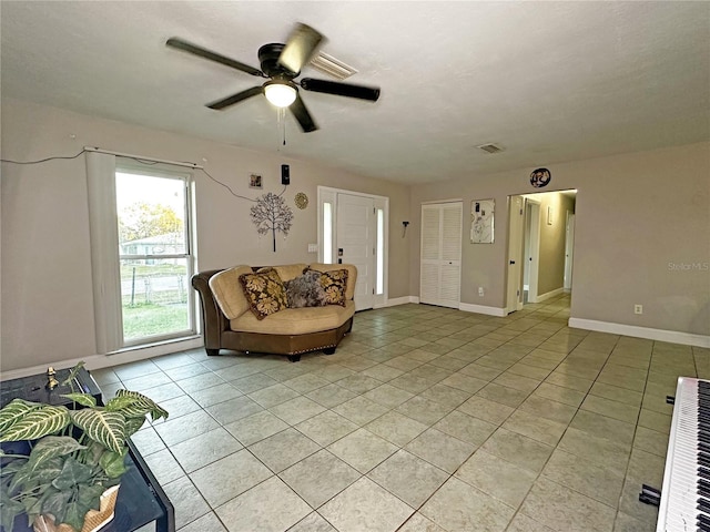 1048 Wakefield Cir, Deltona, FL 32725 - sitting room featuring light tile patterned flooring and a ceiling fan