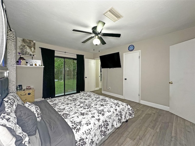 1048 Wakefield Cir, Deltona, FL 32725 - bedroom featuring wood finished floors, access to outside, and ceiling fan