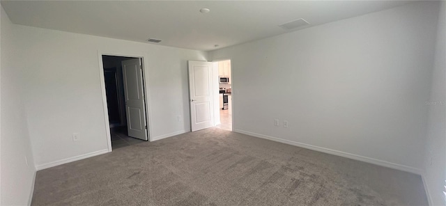 view of carpeted spare room