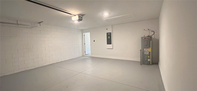 garage featuring water heater and a garage door opener