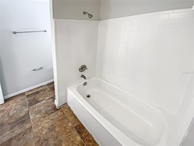 bathroom with shower / bath combination