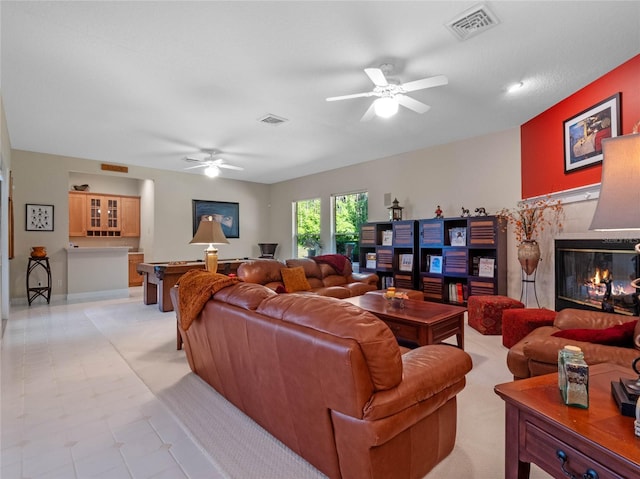 living room featuring ceiling fan