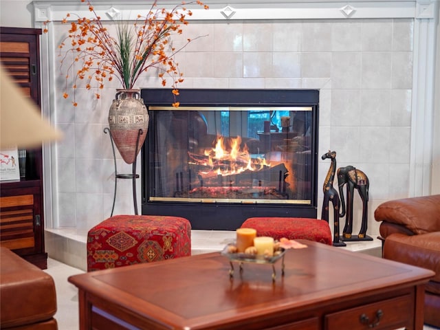 interior space featuring a tiled fireplace