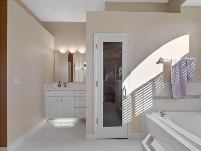 bathroom featuring plus walk in shower and vanity