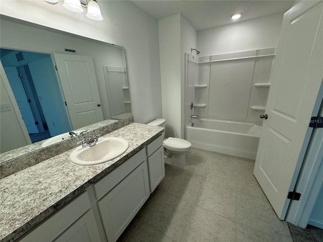 full bathroom with tile patterned floors, vanity, toilet, and bathtub / shower combination