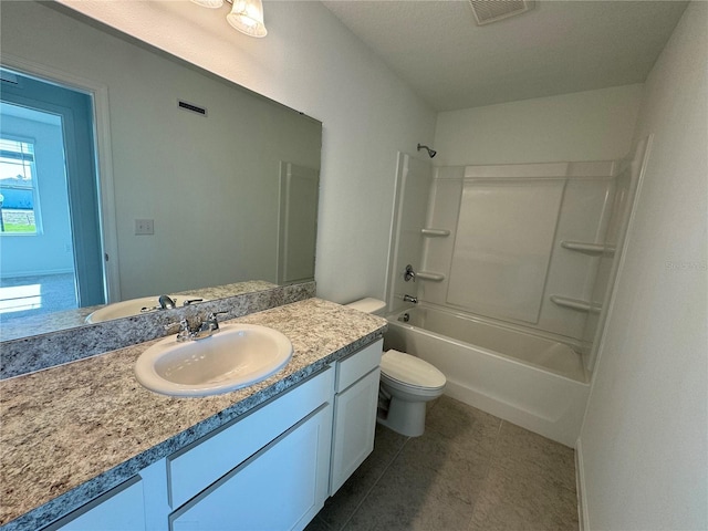 full bathroom featuring vanity, toilet, and shower / tub combination